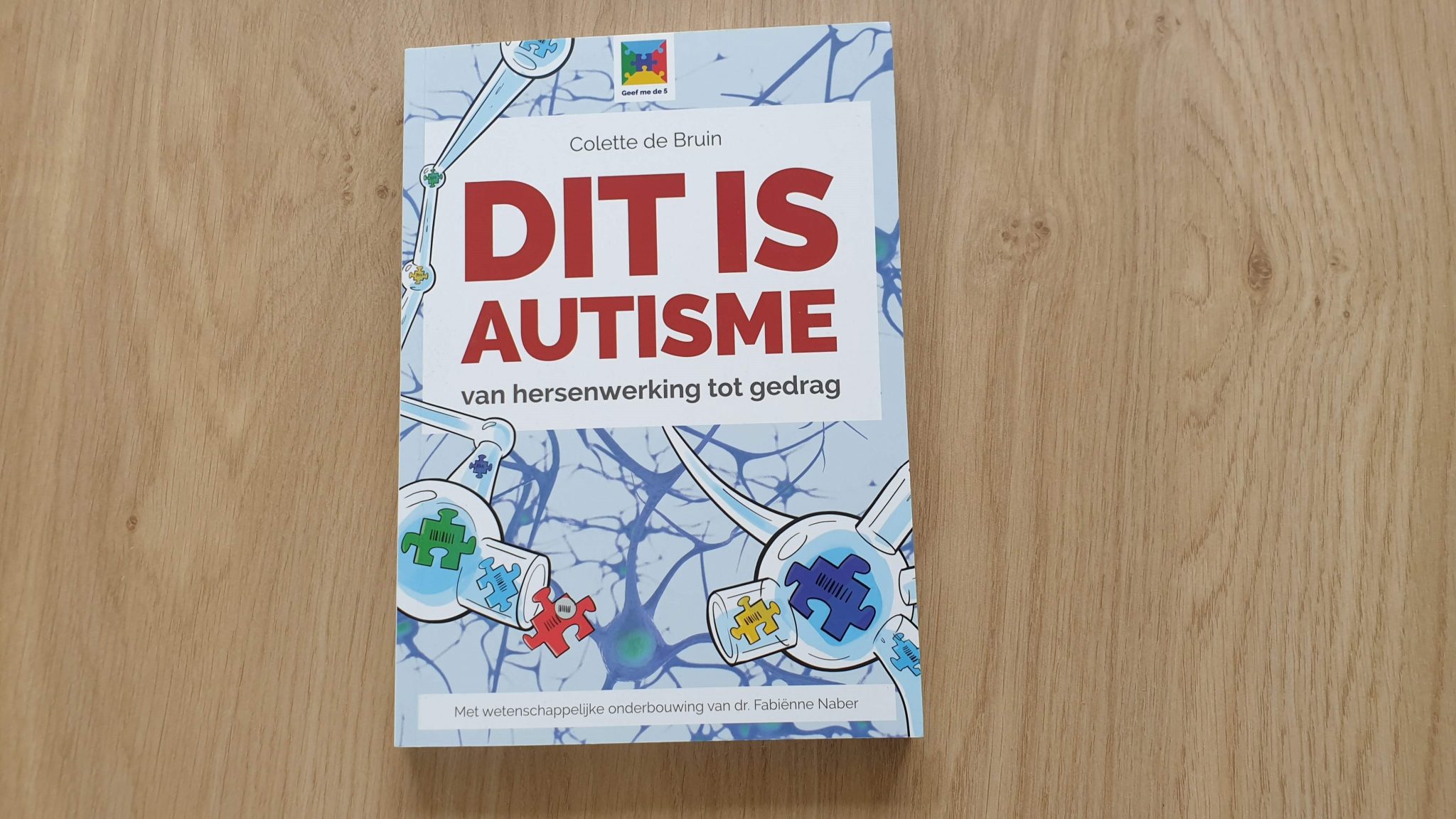 Dit is autisme de voorkant van het boek.